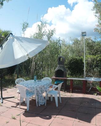 Trilocale con giardino sul mare