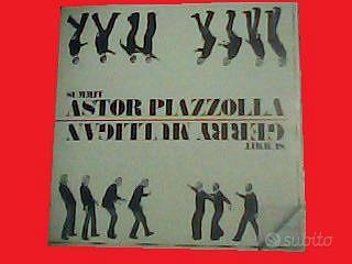 Dischi vinile 33 giri di vario genere e artisti