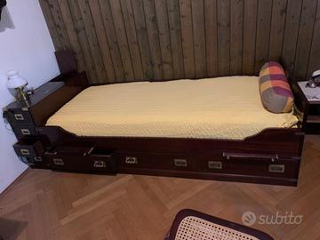 cameretta in stile con due letti e due armadi