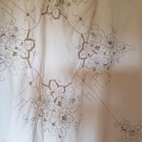 Tovaglia rotonda cotone con ricami ad intaglio 