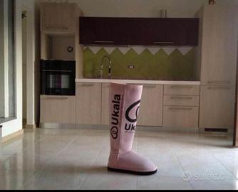 Cucina e mobile sala in laminato