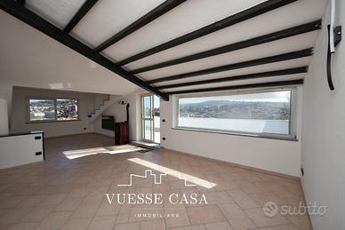 Attico panoramico con tre camere da letto