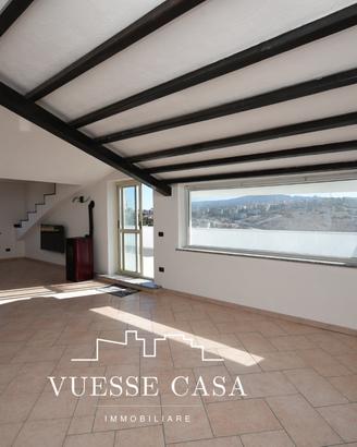 Attico panoramico con tre camere da letto