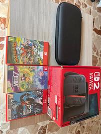 Switch 2 pacchetto completo scheda 256 e 3 giochi