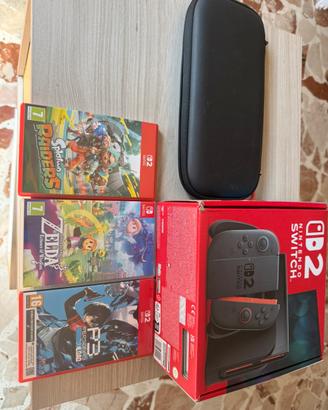 Switch 2 pacchetto completo scheda 256 e 3 giochi