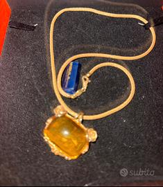 Collier in oro e ambra lavorata