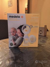 tiralatte e scaldabiberon