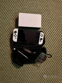 Nintendo Switch OLED + 6 Giochi e Accessori