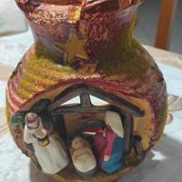 Porta candele, con natività.