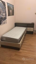 Letto singolo con testiera in legno