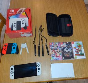 Nintendo Switch OLED - 4 Giocatori - 3 Giochi