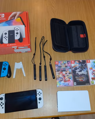 Nintendo Switch OLED - 4 Giocatori - 3 Giochi