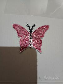 Calamite a forma di farfalla fatte a mano