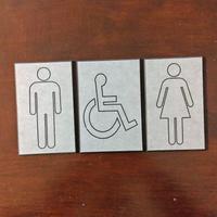 tre targhette indicative in bachelite 