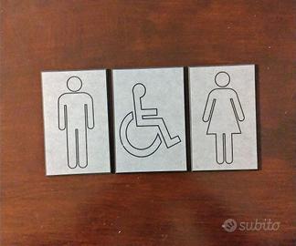 tre targhette indicative in bachelite 