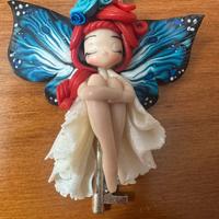 Collana lunga in acciaio con ciondolo a fata