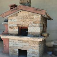 casetta prefabbricata con forno e barbecue