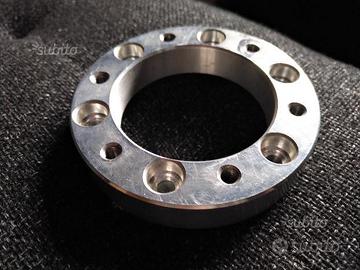 Flangia adattatrice per volanti