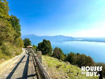 Rudere con terreno vista lago