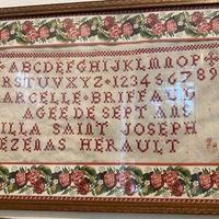 Antichi imparaticci ricamati a mano