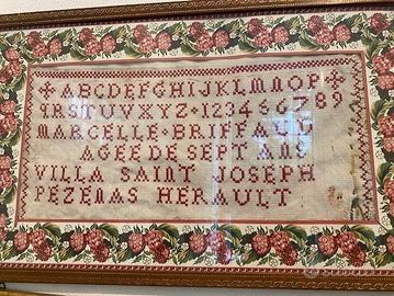 Antichi imparaticci ricamati a mano