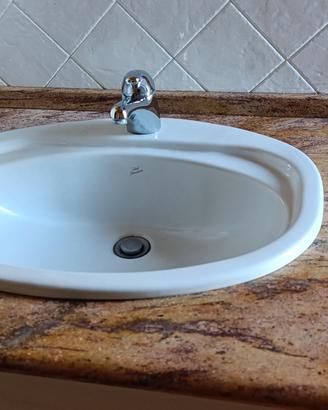 lavabo da incasso,miscelatore e piano di granito