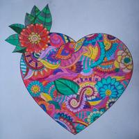 cuore mandala colorato a mano 