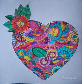 cuore mandala colorato a mano 