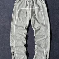 Pantaloni tuta