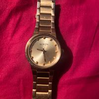 NIXON Gold Tone