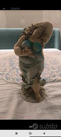 statua