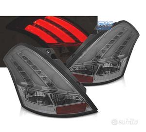 FANALI SUZUKI SWIFT V 10-17 NUOVA STRISCIA LED FUM