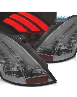 FANALI SUZUKI SWIFT V 10-17 NUOVA STRISCIA LED FUM