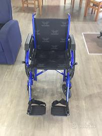 Carrozzina - Sedia a rotelle