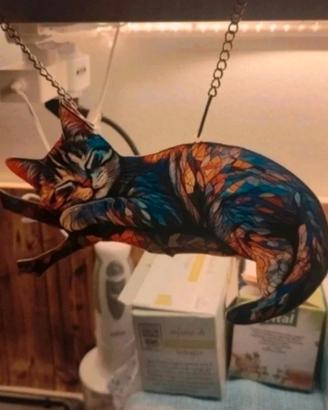 Decorazione artistica gatto su ramo multicolore
