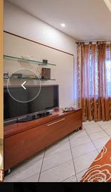 Parete attrezzata porta TV in ciliegio e bianco