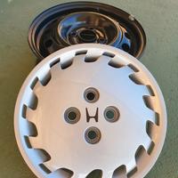 Set 4 cerchi 14 x 5j completi di copricerchi honda