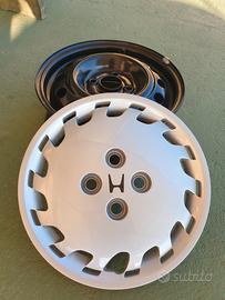 Set 4 cerchi 14 x 5j completi di copricerchi honda