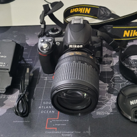 Nikon D3100 + 18-105mm