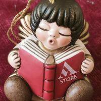 Thun angioletto natalizio con libro Mondadori