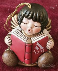 Thun angioletto natalizio con libro Mondadori
