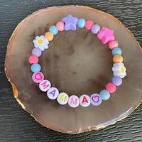 Braccialetto perle con scritta mamma