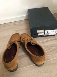 Clarcks wallabe sued/cola