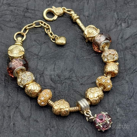 Bracciale charms oro e viola portafortuna