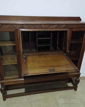 ribaltina antica con piccola libreria