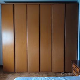 armadio, comò, comodini, letto 