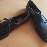 Stringate Malloni in pelle