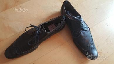 Stringate Malloni in pelle