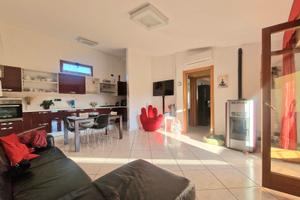 Trivano con veranda e posto auto coperto