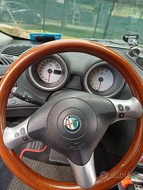 volante in radica con comandi radio alfa 156